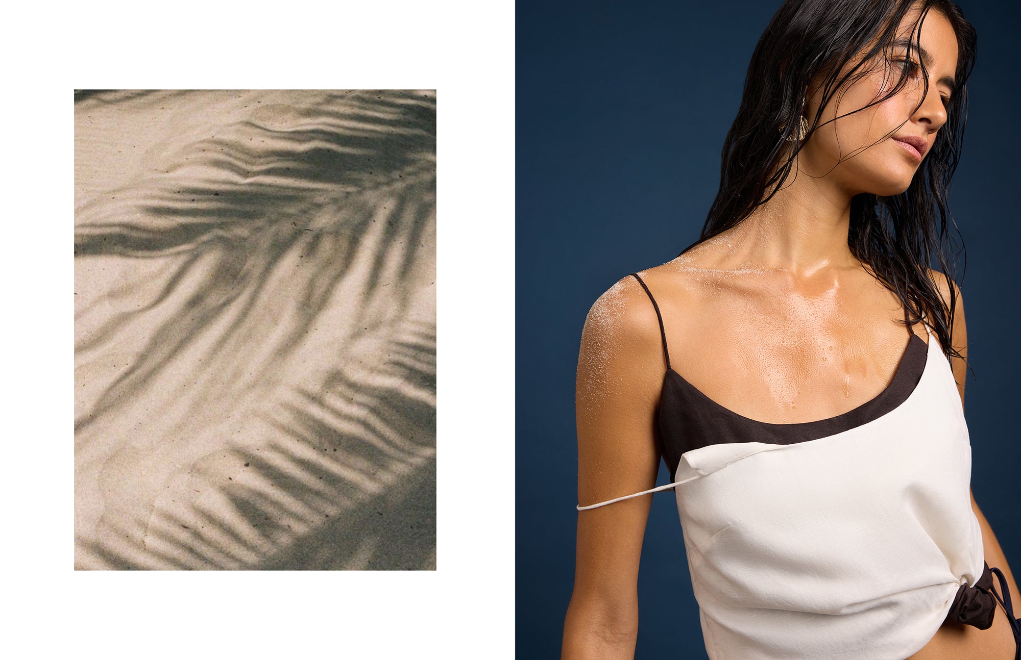 Woman wearing a white top with black straps against a dark blue background, with a close-up of palm leaf shadows on sand.