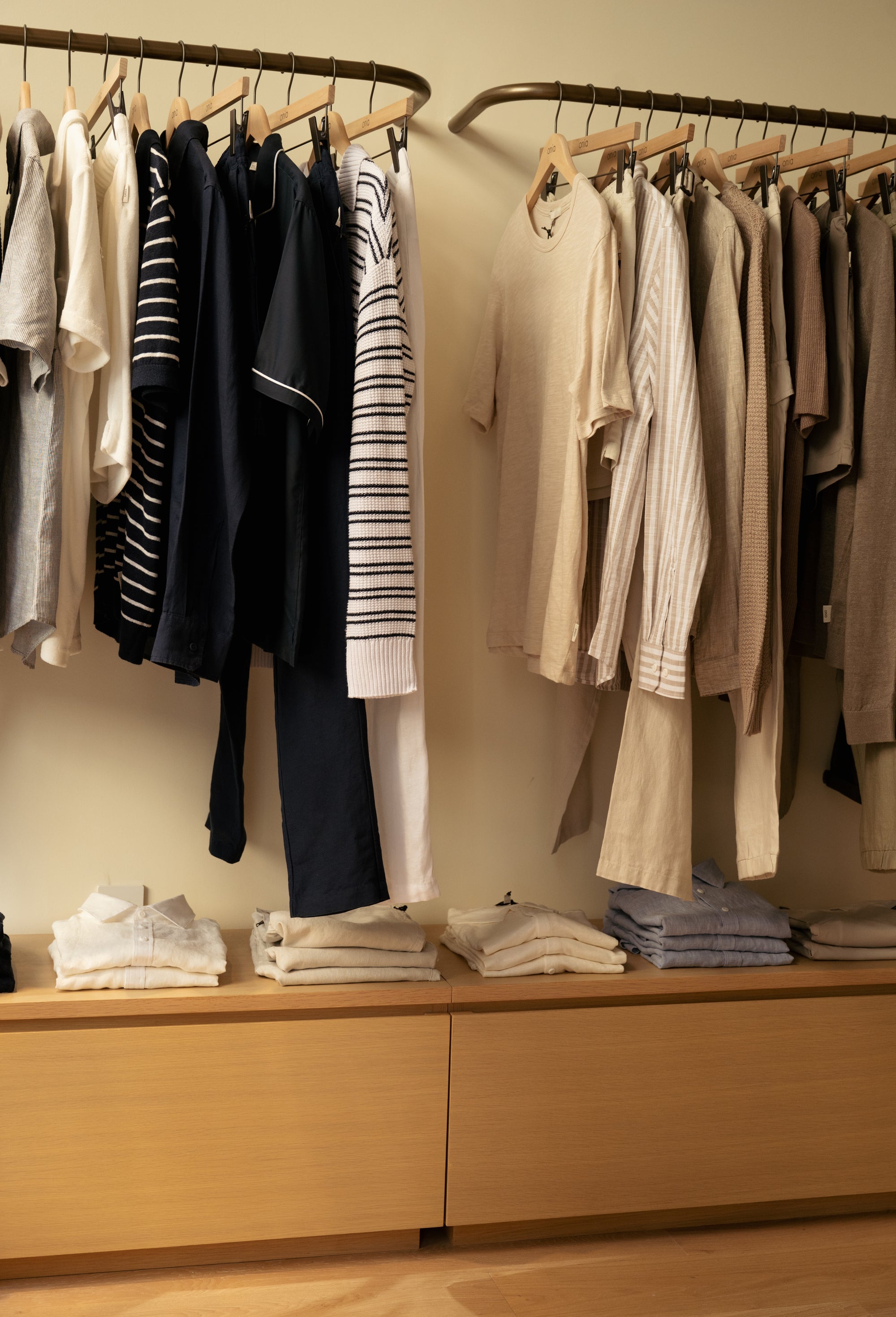 Onia Store interior with clothes hanging on metal racks